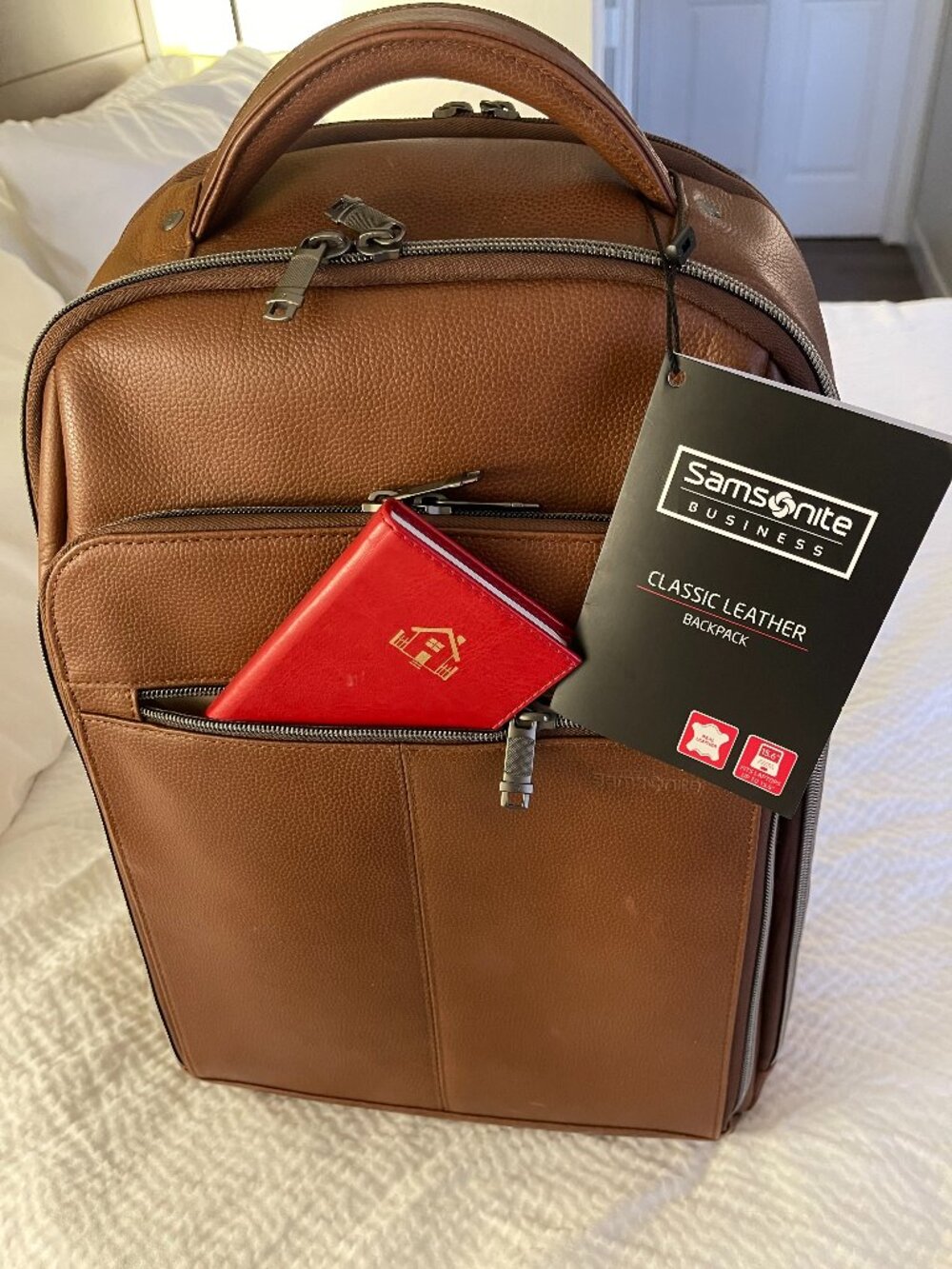 Samsonite Classic Leather Slim Backpack in cognac top grain leather